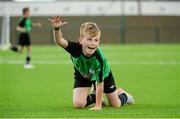 1 September 2015; A participant mimics the goal celebration of Swansea strike Bafétimbi Gomis during the FAI Golden Camp, a summer camp run by the FAI for season ticket holders who participated in the Sports World Summer Soccer Schools Programme. Abbotstown, Co. Dublin. Picture credit: Sam Barnes / SPORTSFILE