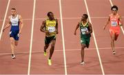 26 August 2015; Athletes, from left, Daniel Taylor of Great Britain, Usain Bolt of Jamaica, left, Anaso Jobodwana of South Africa and Kenji Fujimitsu of Japan in action during the semi-finals of the Men's 200m event. IAAF World Athletics Championships Beijing 2015 - Day 5, National Stadium, Beijing, China. Picture credit: Stephen McCarthy / SPORTSFILE