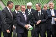 2 August 2015; An Taoiseach Enda Kenny TD, centre, chats with, front row from left, Philip Browne, IRFU Chief Executive, and Dick Spring, Chairman of the IRFU Oversight Board, alongside Jonathan Bell TD, far right, Minister of Enterprise, Trade and Investment for Northern Ireland. Also pictured are, back row, left to right, Brian O'Driscoll, IRFU Bid Ambassador, Tom Grace, IRFU Honorary Treasurer, Ard Stiúrthóir of the GAA and IRFU board member Páraic Duffy. Rugby World Cup 2023 Oversight Board Meeting. Aviva Stadium, Lansdowne Road, Dublin. Picture credit: Cody Glenn / SPORTSFILE