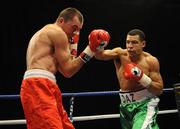 6 March 2009; Darren Sutherland in action against Siarhei Navarka during their Super Middleweight bout. Frank Maloney Promotions, Darren Sutherland v Siarhei Navarka, Robin Park Centre, Wigan, England. Picture credit: Brian Lawless / SPORTSFILE