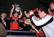 7 March 2009; UCC captain Kevin Harnett lifts the Fitzgibbon Cup. Ulster Bank Fitzgibbon Cup Final, UL v UCC, Parnell Park, Dublin. Picture credit: Pat Murphy / SPORTSFILE