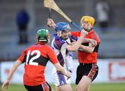 7 March 2009; Dylan Hayden, UL, in action against John Mulhall, no. 12, and Bryan O'Sullivan, UCC. Ulster Bank Fitzgibbon Cup Final, UL v UCC, Parnell Park, Dublin. Picture credit: Pat Murphy / SPORTSFILE