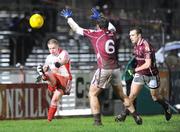 7 March 2009; Colm McCullagh, Tyrone, in action against Diarmuid Blake, no. 6, and Cormac Blake, Galway. Allianz GAA National Football League, Division 1, Round 3, Tyrone v Galway, Healy Park, Omagh, Co. Tyrone. Picture credit: Oliver McVeigh / SPORTSFILE