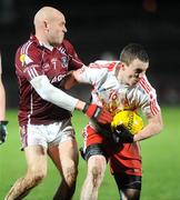 7 March 2009; Tommy McGuigan, Tyrone, in action against Darren Mulahy, Galway. Allianz GAA National Football League, Division 1, Round 3, Tyrone v Galway, Healy Park, Omagh, Co. Tyrone. Picture credit: Oliver McVeigh / SPORTSFILE