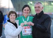 8 March 2009; Ireland's Mary Cullen with her parents Geraldine and Pat and the bronze medal she won in the Women's 3000m. European Indoor Athletics Championships, Oval Lingotto, Torino, Italy. Picture credit: Brendan Moran / SPORTSFILE