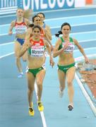 8 March 2009; Ireland's Mary Cullen comes down the finishing straight with eventual second placed Sara Moreira of Portugal on her way to finishing 3rd in the Women's 3000m Final in a time of 8:48.47. European Indoor Athletics Championships, Oval Lingotto, Torino, Italy. Picture credit: Brendan Moran / SPORTSFILE