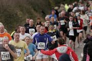 8 March 2009; A general view of competitors passing through a water station during the Ballycotton 10 mile Road Race. Ballycotton, Co. Cork. Picture credit: Tomas Greally / SPORTSFILE