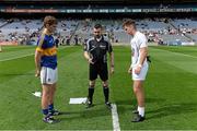 30 August 2015; Referee Noel Mooney performs the coin toss in the company of team captains Danny Owens, Tipperary, and Conor Hartley, Kildare. Electric Ireland GAA Football All-Ireland Minor Championship, Semi-Final, Kildare v Tipperary, Croke Park, Dublin. Picture credit: Brendan Moran / SPORTSFILE
