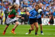 30 August 2015; Katie Kehoe, Horeswood NS, Campile, New Ross, Wexford, representing Dublin, in action against Hazel O'Reilly-Higgins, Baconstown, NS, Enfield, Meath, representing Mayo, in action during the Cumann na mBunscol INTO Respect Exhibition Go Games 2015 at Dublin v Mayo - GAA Football All-Ireland Senior Championship Semi-Final. Croke Park, Dublin. Picture credit: Ramsey Cardy / SPORTSFILE