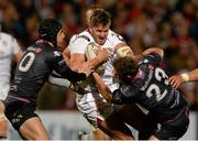 4 September 2015; Stuart McCloskey, Ulster, is tackled by Sam Davies and Ashley Beck, Ospreys. Guinness PRO12, Round 1, Ulster v Osprey. Kingspan Stadium, Belfast. Picture credit: Oliver McVeigh / SPORTSFILE