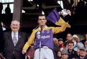 17 March 1995; Kilmacud Crokes captain Mick Dillon lifts the Andy Merrigan Cup. AIB All-Ireland Club Football Final, Kilmacud Crokes v Bellaghy, Croke Park, Dublin. Picture credit: Ray McManus / SPORTSFILE