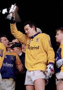 17 March 1995; Kilmacud Crokes goalkeeper Mick Pender lifts the Andy Merrigan Cup. AIB All-Ireland Club Football Final, Kilmacud Crokes v Bellaghy, Croke Park, Dublin. Picture credit: Ray McManus / SPORTSFILE