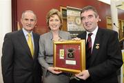 13 March 2009; President Mary McAleese, centre, and her husband Dr. Martin McAleese, left, are presented with a special Ulster GAA medal by Ulster GAA President Tom Daly, right, during the GAA 125 Years History Conference. The conference entitled, 'For Community, Club, County and Country', is a celebration of 125 years of GAA history. Cardinal Ó Fiaich Library & Archive, Armagh. Picture credit: Oliver McVeigh / SPORTSFILE