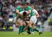 5 September 2015; Courtney Lawes, England, is tackled by Jonathan Sexton, left, and Jared Payne, Ireland. Rugby World Cup Warm-Up Match, England v Ireland. Twickenham Stadium, London, England. Picture credit: Brendan Moran / SPORTSFILE