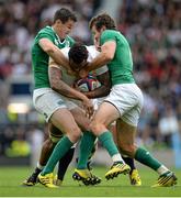 5 September 2015; Courtney Lawes, England, is tackled by Jonathan Sexton, left, and Jared Payne, Ireland. Rugby World Cup Warm-Up Match, England v Ireland. Twickenham Stadium, London, England. Picture credit: Brendan Moran / SPORTSFILE