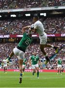 5 September 2015; Anthony Watson, England, collects a cross field ball ahead of Simon Zebo, Ireland, on his way to scoring his side's second try. Rugby World Cup Warm-Up Match, England v Ireland. Twickenham Stadium, London, England. Picture credit: Brendan Moran / SPORTSFILE