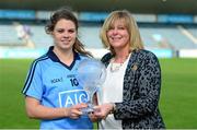 5 September 2015; Noelle Healy, Dublin, is presented with the LGFA / TG4 Player of the Match award by Marie Hickey, President, Ladies Gaelic Football Association. TG4 Ladies Football All-Ireland Senior Championship Semi-Final, Armagh v Dublin. Parnell Park, Dublin. Picture credit: Piaras Ó Mídheach / SPORTSFILE