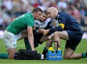 5 September 2015; Robbie Henshaw, Ireland, is attended to by team doctor Dr. Eanna Falvey before leaving the pitch. Rugby World Cup Warm-Up Match, England v Ireland. Twickenham Stadium, London, England. Picture credit: Brendan Moran / SPORTSFILE