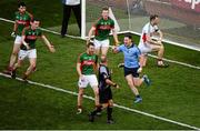 5 September 2015; Philip McMahon, Dublin, celebrates after scoring his side's second goal, as Mayo players surround referee Eddie Kinsella in protest. GAA Football All-Ireland Senior Championship Semi-Final Replay, Dublin v Mayo. Croke Park, Dublin. Picture credit: Dáire Brennan / SPORTSFILE