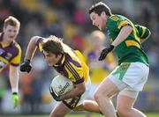 15 March 2009; Brian Malone, Wexford, in action against Cian Ward, Meath. Allianz GAA National Football League, Division 2, Round 4, Wexford v Meath, Wexford Park, Wexford. Picture credit: Brian Lawless / SPORTSFILE