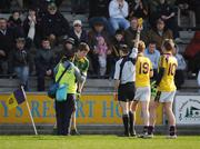15 March 2009; Wexford's Eric Bradley, 19, is shown the yellow card by referee Michael Collins. Allianz GAA National Football League, Division 2, Round 4, Wexford v Meath, Wexford Park, Wexford. Picture credit: Brian Lawless / SPORTSFILE