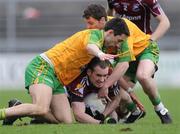 15 March 2009; Damien Burke, Galway, in action against Rory Kavanagh and Paddy McDaid, Donegal. Allianz GAA National Football League, Division 1, Round 4, Galway v Donegal, Pearse Stadium, Galway. Picture credit: Ray Ryan / SPORTSFILE