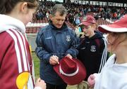 15 March 2009; Galway manager Liam Sammon signs autographs for young supporters after the game. Allianz GAA National Football League, Division 1, Round 4, Galway v Donegal, Pearse Stadium, Galway. Picture credit: Ray Ryan / SPORTSFILE