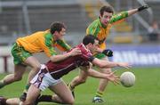 15 March 2009; Joe Bergin, Galway, in action against Paddy McDaid and Eoin Wade, Donegal. Allianz GAA National Football League, Division 1, Round 4, Galway v Donegal, Pearse Stadium, Galway. Picture credit: Ray Ryan / SPORTSFILE