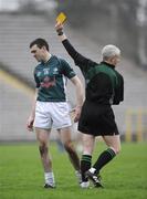 15 March 2009; Kildare Captain John Doyle receives a yellow card, in the second half, from referee Thomas Quigley. Allianz GAA National Football League, Division 2, Round 4, Monaghan v Kildare, St Tighearnach's Park, Clones, Co. Monaghan. Picture credit: Oliver McVeigh / SPORTSFILE *** Local Caption ***