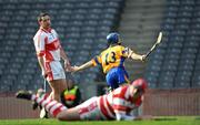 17 March 2009; Damien Hayes celebrates after beating the De La Salle full-back Ian Flynn and goalkeeper Stevie Brenner to score the first goal for Portumna. AIB All-Ireland Senior Club Hurling Championship Final, Portumna, Co. Galway, v De La Salle, Waterford, Croke Park, Dublin. Picture credit: Ray McManus / SPORTSFILE