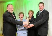 14 March 2009; Cathal Goan, RTE Director General, left, presents the award for Camogie Photo of the year to Stephen McCarthy, Sportsfile, far right, with Lilly Dunne, wife of the late Mick Dunne, and Liz Howard, Uachtarán Chumann Camógaíochta na nGael, during the Mick Dunne Memorial Awards 2008, sponsored by RTE. Croke Park, Dublin. Picture credit: Ray Lohan / SPORTSFILE