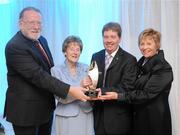 14 March 2009; Cathal Goan, RTE Director General, left, presents the award for Published Article of the Year to Seamus Mac Giollafhinnein, Co. Antrim, Irish News, with Lilly Dunne, wife of the late Mick Dunne, and Liz Howard, Uachtarán Chumann Camógaíochta na nGael, during the Mick Dunne Memorial Awards 2008, sponsored by RTE. Croke Park, Dublin. Picture credit: Ray Lohan / SPORTSFILE
