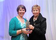 14 March 2009; Máire Ui Scolai, National Results Coordinator of Camogie, left, is presented with the Inaugural President's award by Liz Howard, Uachtarán Chumann Camógaíochta na nGael, during the Cumann Camógaíochta na nGael Media Awards 2009. Croke Park, Dublin. Picture credit: Ray Lohan / SPORTSFILE