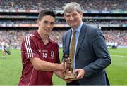 6 September 2015; Representing Electric Ireland, proud sponsor of the GAA All-Ireland Minor Hurling Championship, is Pat O’Doherty, Chief Executive, ESB, presenting Evan Niland, Galway, with the Player of the Match award for his outstanding performance in the Electric Ireland GAA Minor Hurling Championship Final, Galway vs Tipperary in Croke Park. Throughout the Championship fans have followed the action, supported the Minors and been a part of something major through the hashtag #ThisIsMajor. Croke Park, Dublin. Picture credit: Brendan Moran / SPORTSFILE
