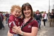 6 September 2015; Galway supporters Eanna Walsh, age 1, and mother Assumpta Walsh, from Carnmore, Co. Galway, on their way to the game on Jones' Road. Supporters at GAA Hurling All-Ireland Minor and Senior Finals, Croke Park, Dublin. Picture credit: Cody Glenn / SPORTSFILE