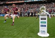 6 September 2015; Cyril Donnellan, left, and Cathal Mannion, Galway, run past the Liam MacCarthy cup. GAA Hurling All-Ireland Senior Championship Final, Kilkenny v Galway, Croke Park, Dublin. Picture credit: Stephen McCarthy / SPORTSFILE