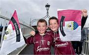 6 September 2015; Galway supporters and brothers Cathal D'Arcy, left, age 8, and Sean, age 10, from Galway City, cross the Ha'penny Bridge on their way to the game. Supporters at GAA Hurling All-Ireland Minor and Senior Finals, Croke Park, Dublin. Picture credit: Cody Glenn / SPORTSFILE