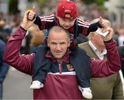 6 September 2015; Galway supporters Oliver Mooney, age 4, on the shoulders of his father Cathal Mooney, from Antrim, on their way to the game. Supporters at GAA Hurling All-Ireland Minor and Senior Finals, Croke Park, Dublin. Picture credit: Cody Glenn / SPORTSFILE