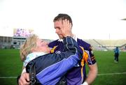 17 March 2009; Daisy Magee congratulates her son Darren after Kilmacud Crokes won the AIB All-Ireland Senior Club Football Championship Final match between Crossmaglen Rangers, Armagh and Kilmacud Crokes, Dublin at Croke Park in Dublin. Photo by Ray McManus/Sportsfile