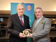 17 March 2009; Michael Carroll, Tipperary, is presented with a GAA President's Award by GAA President Nickey Brennan. Presentation of the GAA President’s Awards 2009. Croke Park, Dublin. Picture credit: Ray McManus / SPORTSFILE