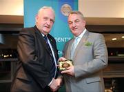 17 March 2009; Eamonn Campion, Roscommon, is presented with a GAA President's Award by GAA President Nickey Brennan. Presentation of the GAA President’s Awards 2009. Croke Park, Dublin. Picture credit: Ray McManus / SPORTSFILE