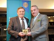17 March 2009; Declan O'Neill, Tyrone, is presented with a GAA President's Award by GAA President Nickey Brennan. Presentation of the GAA President’s Awards 2008. Croke Park, Dublin. Picture credit: Ray McManus / SPORTSFILE