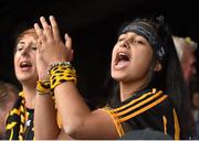 6 September 2015; Kilkenny supporter Shannon Rai, from Thomastown, Co. Kilkenny, cheers in the final minutes of the game. Supporters at GAA Hurling All-Ireland Minor and Senior Finals, Croke Park, Dublin. Picture credit: Cody Glenn / SPORTSFILE