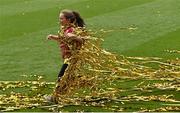 6 September 2015; A young Kilkenny supporter runs through fallen confetti on the pitch after the game. Supporters at GAA Hurling All-Ireland Minor and Senior Finals, Croke Park, Dublin. Picture credit: Cody Glenn / SPORTSFILE
