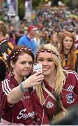 6 September 2015; Galway supporters snap a selfie together after the match on a crowded Jones' Road. Supporters at GAA Hurling All-Ireland Minor and Senior Finals, Croke Park, Dublin. Picture credit: Cody Glenn / SPORTSFILE