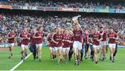 6 September 2015; Andrew Greaney, Galway, holds the Irish Press cup during the Galway team lap of honour after the game. Electric Ireland GAA Hurling All-Ireland Minor Championship Final, Galway v Tipperary, Croke Park, Dublin. Picture credit: Dáire Brennan / SPORTSFILE