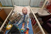 7 September 2015; 11 month old Conor Travers, from Kilkenny, with the Liam MacCarthy Cup during a visit from the GAA Hurling All-Ireland Champions Kilkenny to Our Lady's Children's Hospital, Crumlin, Dublin. Picture credit: Stephen McCarthy / SPORTSFILE