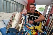 7 September 2015; Kilkenny's Cillian Buckley with 11 month old Conor Travers, Kilkenny, and the Liam MacCarthy Cup during a visit from the GAA Hurling All-Ireland Champions Kilkenny to Our Lady's Children's Hospital, Crumlin, Dublin. Picture credit: Stephen McCarthy / SPORTSFILE