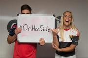 7 September 2015; Intercounty football star and GPA member Eoin Cadogan, Cork, with intercounty footballer Brid Stack, Cork, at the launch of a joint initiative between the GPA and WGPA, which aims to highlight the support of inter-county hurlers and footballers for their female counterparts and encourage increased recognition of their games. The #OnHerSide campaign celebrates the close relationship between the two organisations and with both sets of players sharing similar lifestyles and commitments, there is an immense respect for the dedication and skill of female GAA athletes among the GPA members. #OnHerSide highlights a shared pride in representing the same county, to encourage all GAA members to support their own county representatives. Top players including Eoin Cadogan, Lee Chin and Ger Brennan are supporting the initiative throughout September, when coverage of the women’s games will peak around the All Ireland finals. WGPA/GPA Offices, Dublin.  Picture credit: Brendan Moran / SPORTSFILE