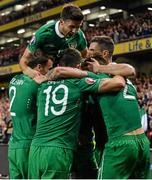 7 September 2015; Jon Walters, hidden, Republic of Ireland, is congratulated by team-mates after scoring his side's first goal. UEFA EURO 2016 Championship Qualifier, Group D, Republic of Ireland v Georgia, Aviva Stadium, Lansdowne Road, Dublin. Picture credit: Cody Glenn / SPORTSFILE
